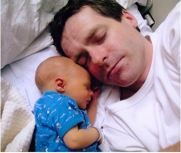 Tom Evans with his baby
